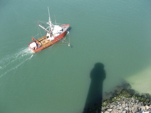 LBI Fishing Boat in shadow of Barnegat Lighthouse